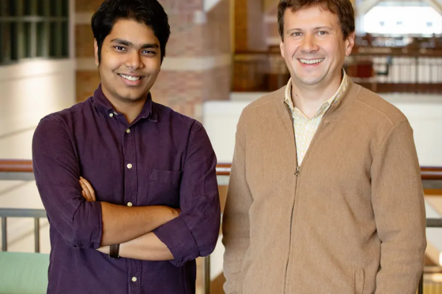 Graduate student Kumar Sarthak and physics professor Aleksei Aksimentiev were part of a research team that demonstrated that nanopores could sequence proteins, giving reserachers and clinicians insight into activity within a cell.   