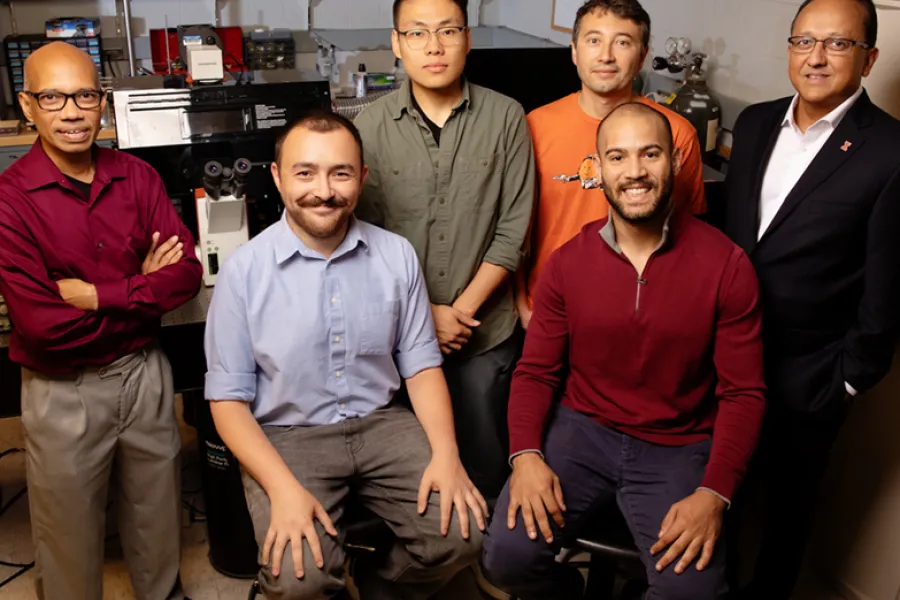 The research team includes, from left, professor Taher Saif, graduate student Onur Aydin, graduate student Xiaotian Zhang, professor Mattia Gazzola, graduate student Gelson J. Pagan-Diaz, seated, and professor and dean of the Grainger College of Engineering, Rashid Bashir. 