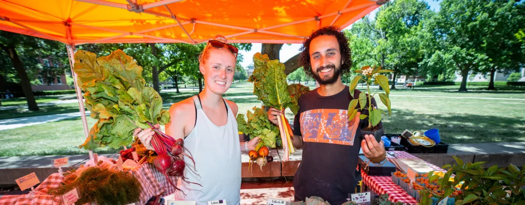 students at farm stand